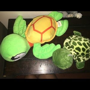 Two stuffed animal sea turtles